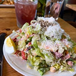 Bluebeard signature dishes The menu changes daily based on ingredient availability, but features house-made charcuterie, creative vegetable dishes, and entrees. The bread is from the connected Amelia's bakery. 